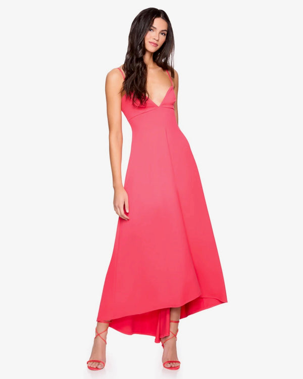 model wearing Susana Monaco Sweetheart String High-Low Dress in Watermelon standing in front of white backdrop