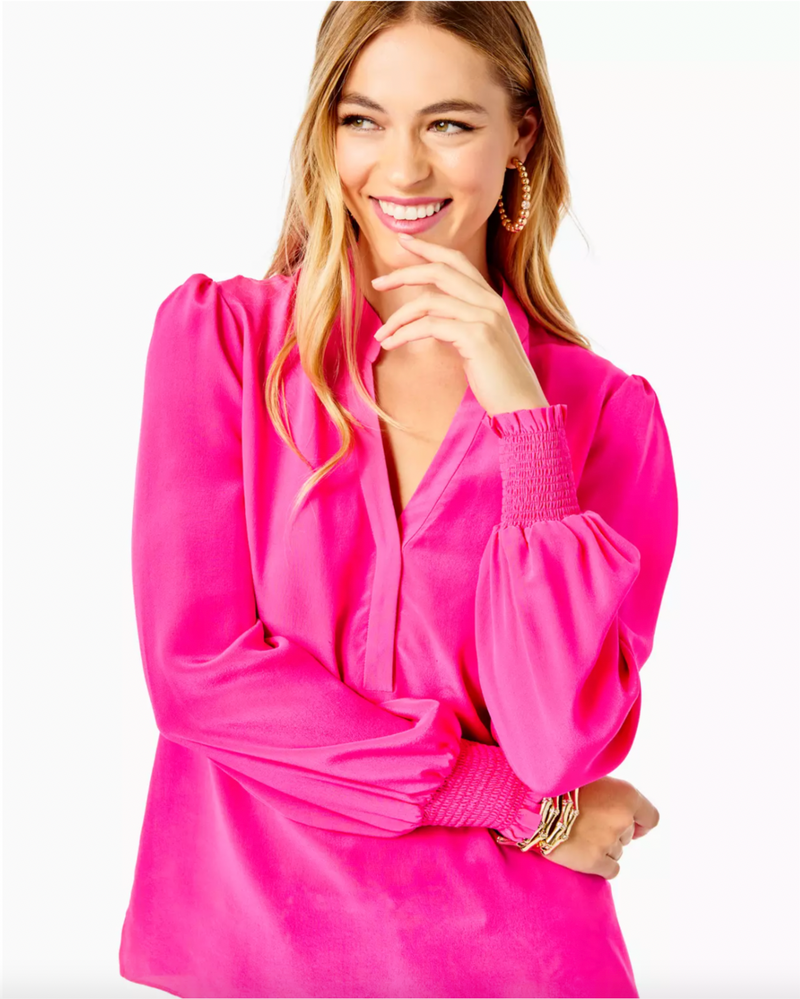 LILLY PULITZER DAE LONG SLEEVE SILK TOP: Effortlessly elegant thanks to its easy fit and silk fabric, the Dae Top is our latest outfitting essential. This popover style offers a stand collar, half placket with hidden snaps, and full sleeves. Side slits at the hem make a breezy finishing touch.  Easy fit, popover top with stand collar, half placket with hidden snaps, long full sleeves with tall smocked cuffs and side slits.  26" in length (based on a size small/4).  100% Silk.  Dry clean only.  Imported.